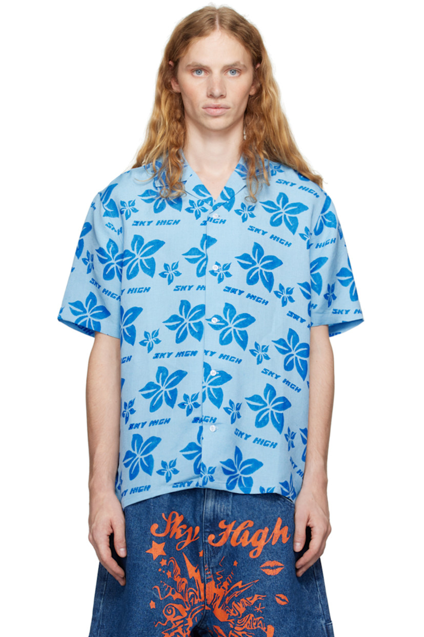 Lightweight linen- and viscose-blend duck canvas shirt. Floral logo pattern hand-block-printed throughout.

· Boxy-fit
· Open spread collar
· Button closure
· Cropped hem

Featuring artwork by Vanna Youngstein.

Supplier color: Blue