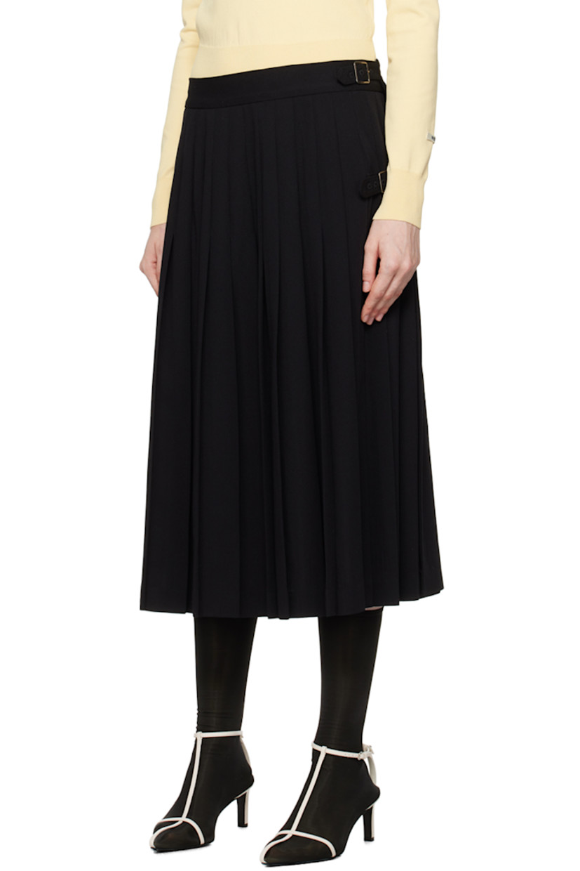Virgin wool twill skirt. Knife pleats throughout.

· Wrap construction
· Pin-buckle tab at waistband and side
· Unlined

Supplier color: Black
