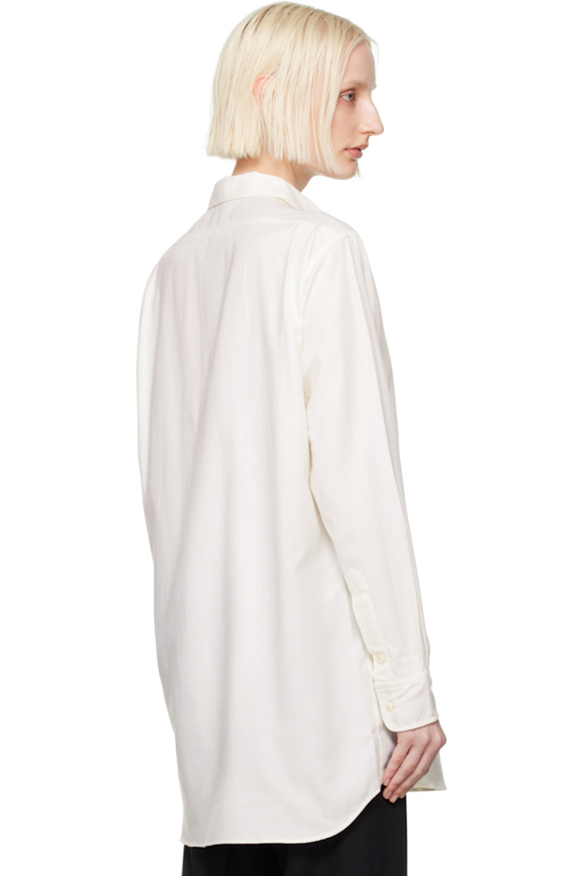 Organic cotton- and cashmere-blend twill shirt.

· Spread collar
· Half-button closure
· Patch pocket
· Droptail hem
· Reinforced trim hand-stitched at side seams
· Logo embroidered at side seam
· Single-button barrel cuffs
· Twin pleats at back yoke

Supplier color: White