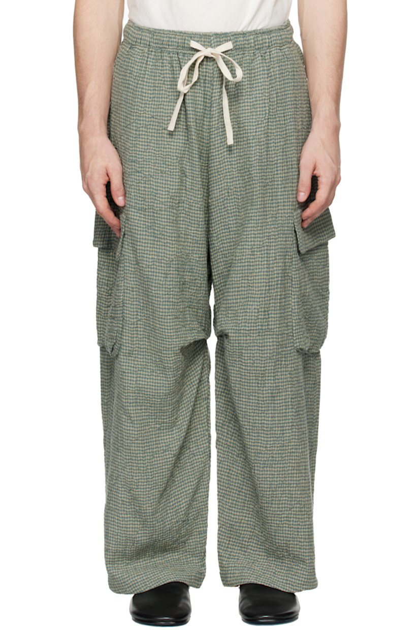 Handcrafted crinkled cotton gauze cargo pants. Check pattern throughout. 

· Drawstring at elasticized waistband
· Cargo pocket at outseams

Supplier color: Blue/Slate