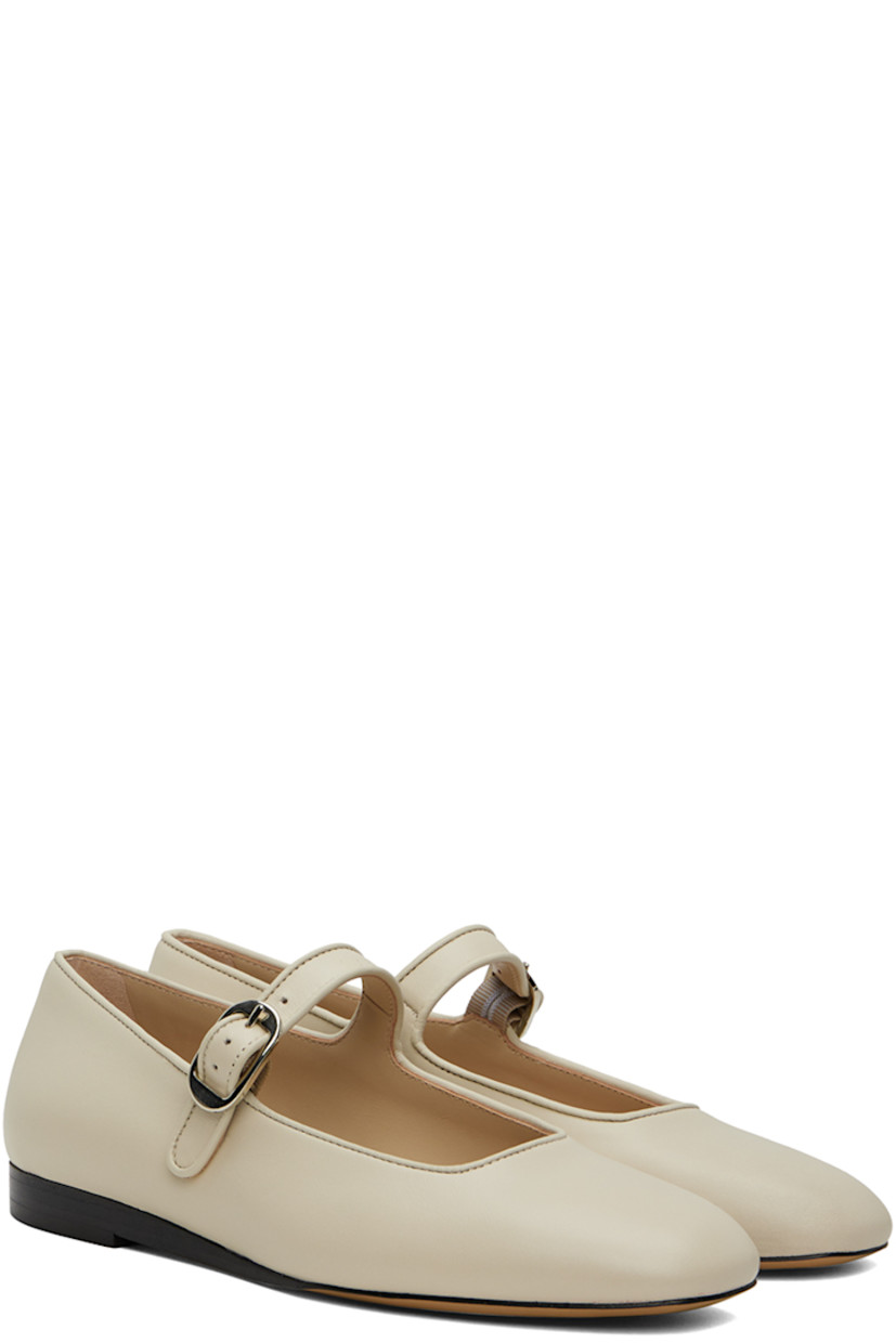 Buffed lambskin Mary Jane-style ballerina flats in off-white.

· Piping at pin-buckle strap and collar
· Logo embossed at cushioned calfskin footbed
· Suede and buffed calfskin lining
· Stacked leather heel with rubber injection
· Leather sole

Supplier color: Ecru
