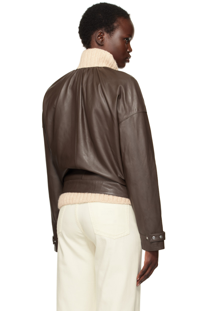 LWG-certified grained lambskin jacket. 

· Gathering at round neck
· Zip closure with press-stud placket
· Flap pockets
· Adjustable press-stud tab at cuffs
· Welt pockets and D-ring at interior
· Full logo-woven satin lining

Supplier color: Chestnut