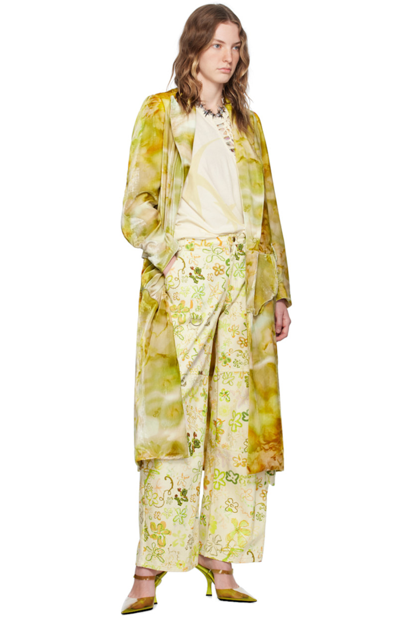 Nylon- and viscose-blend velvet coat. AI-generated graphic pattern printed throughout.

· Peaked lapel
· Concealed press-stud closure
· Flap pockets
· Trompe l'oeil graphic appliqué at front and back
· Central vent at back hem
· Welt pocket at interior
· Full satin lining

Supplier color: Sage molten floral