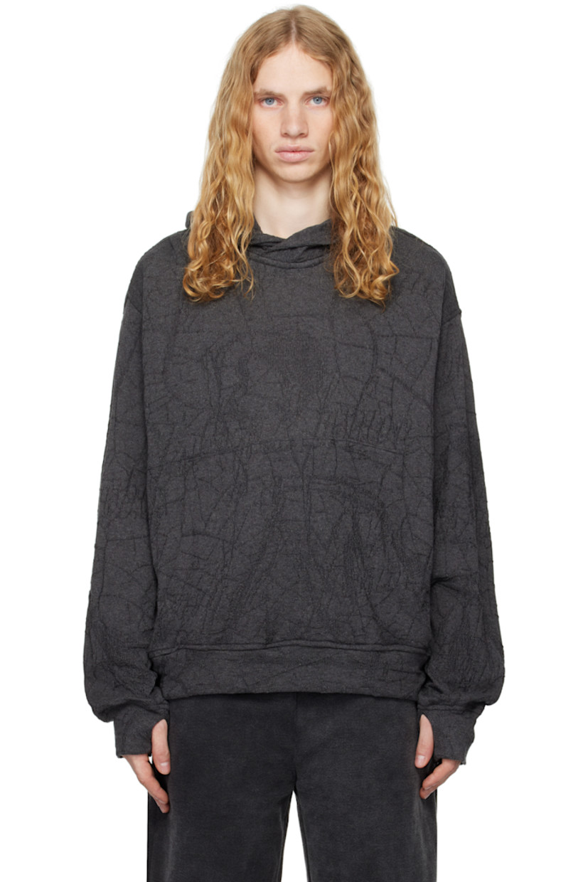 Knit cotton hoodie. Jacquard graphic pattern throughout.

· Kangaroo pocket
· Dropped shoulders
· Thumbhole at cuffs

Part of the RITES OF CARE collection.

Supplier color: Grey