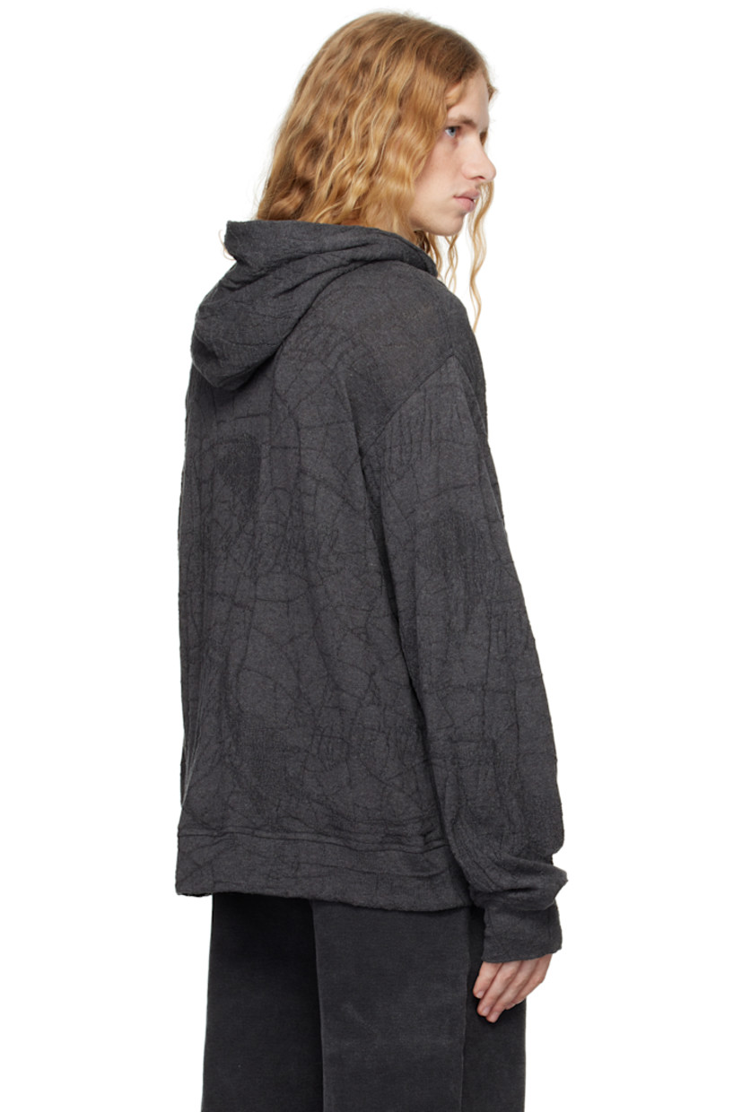 Knit cotton hoodie. Jacquard graphic pattern throughout.

· Kangaroo pocket
· Dropped shoulders
· Thumbhole at cuffs

Part of the RITES OF CARE collection.

Supplier color: Grey
