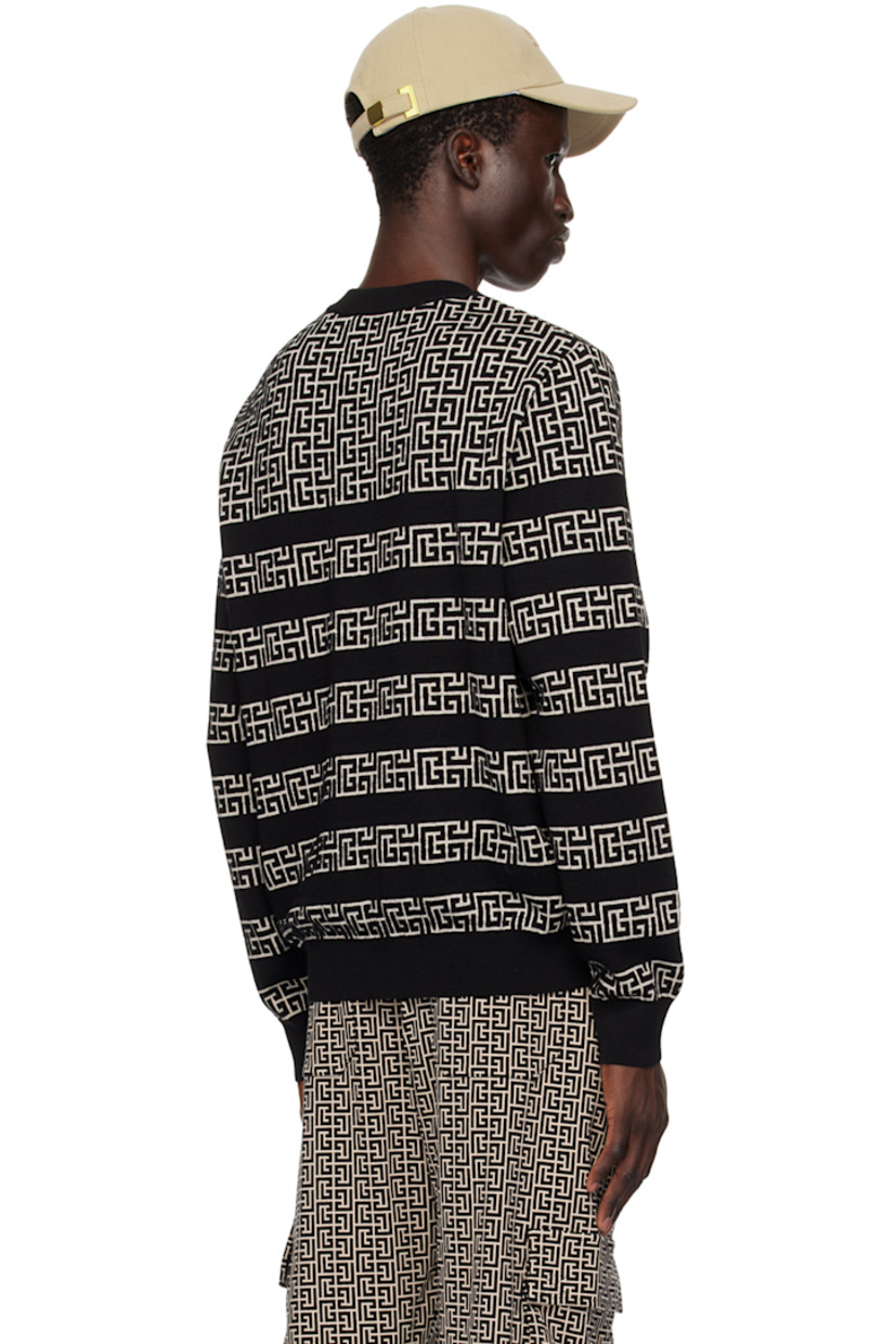 Knit merino wool- and linen-blend sweater. Stripes and jacquard logo pattern throughout. 

· Rib knit crewneck, hem, and cuffs
· Press-stud fastening at shoulder 
· Logo-engraved gold-tone hardware

Supplier color: Ivoire/Noir