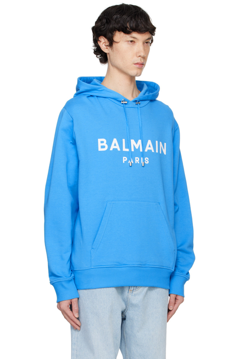 Organic cotton French terry hoodie.

· Cord-lock drawstring at hood
· Logo printed at front
· Kangaroo pocket
· Rib-knit hem and cuffs
· Dropped shoulders

Supplier color: Blue