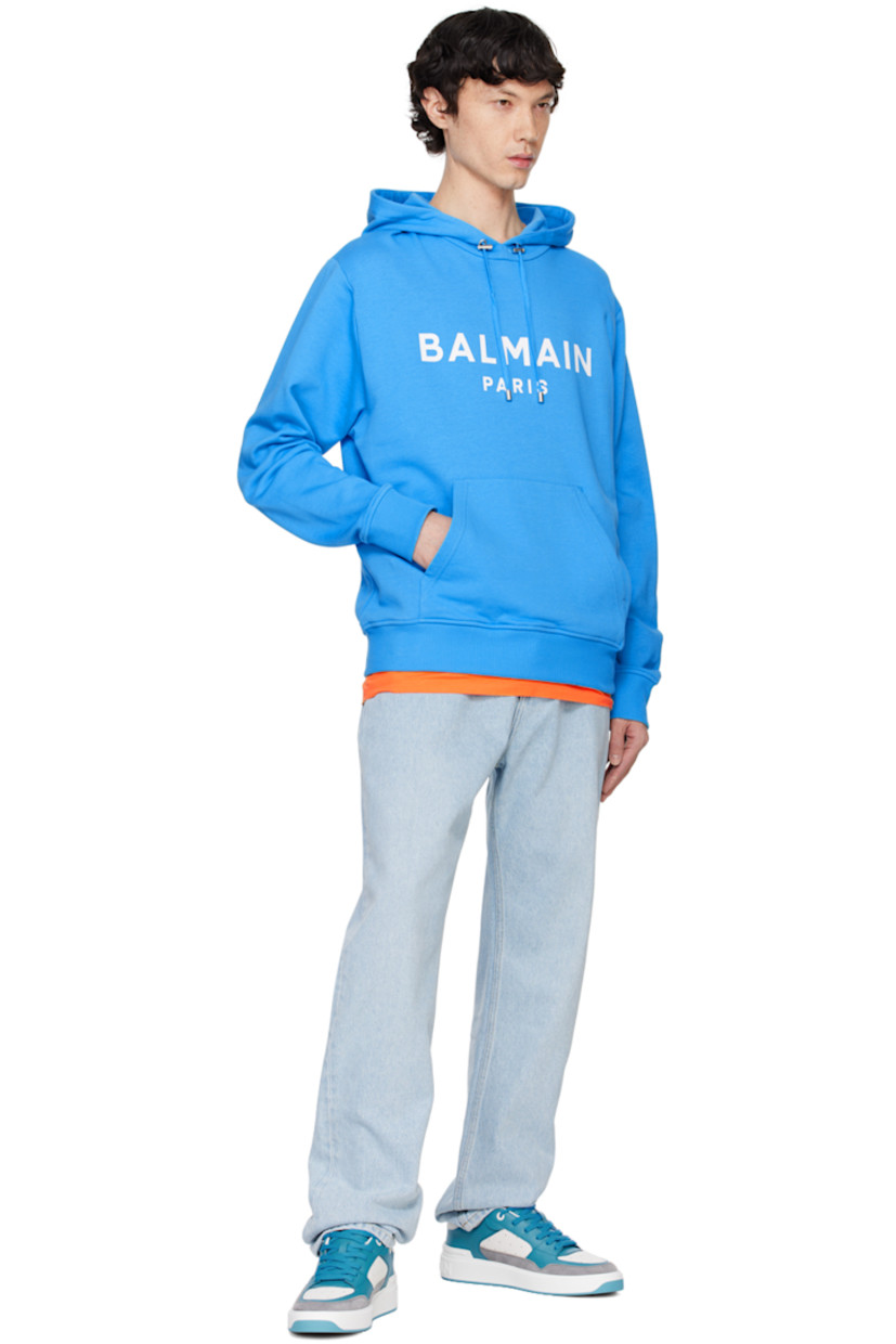 Organic cotton French terry hoodie.

· Cord-lock drawstring at hood
· Logo printed at front
· Kangaroo pocket
· Rib-knit hem and cuffs
· Dropped shoulders

Supplier color: Blue