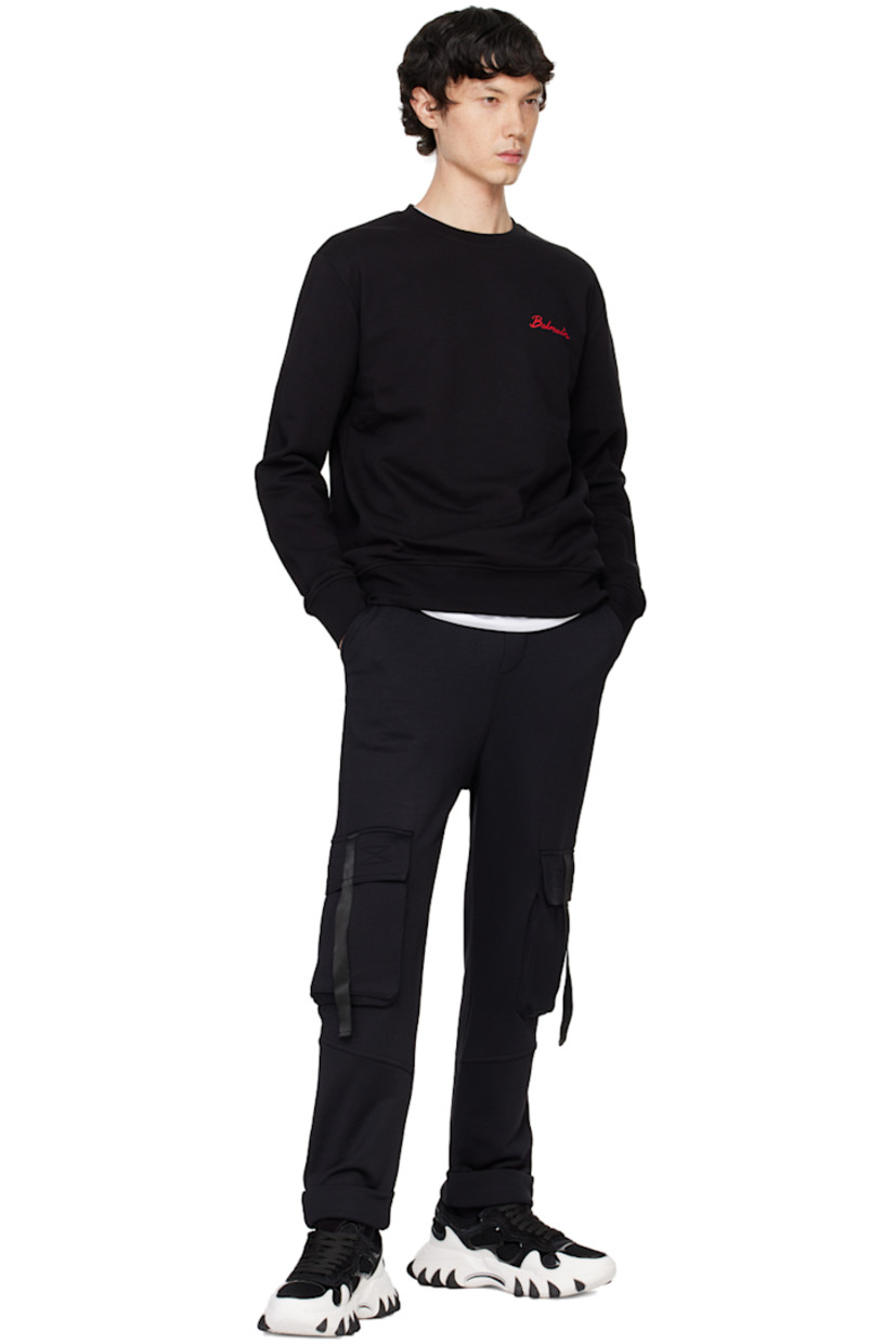 Organic cotton French terry sweatshirt.

· Rib-knit crewneck, hem, and cuffs
· Logo printed at chest
· Graphic printed at back

Supplier color: Black