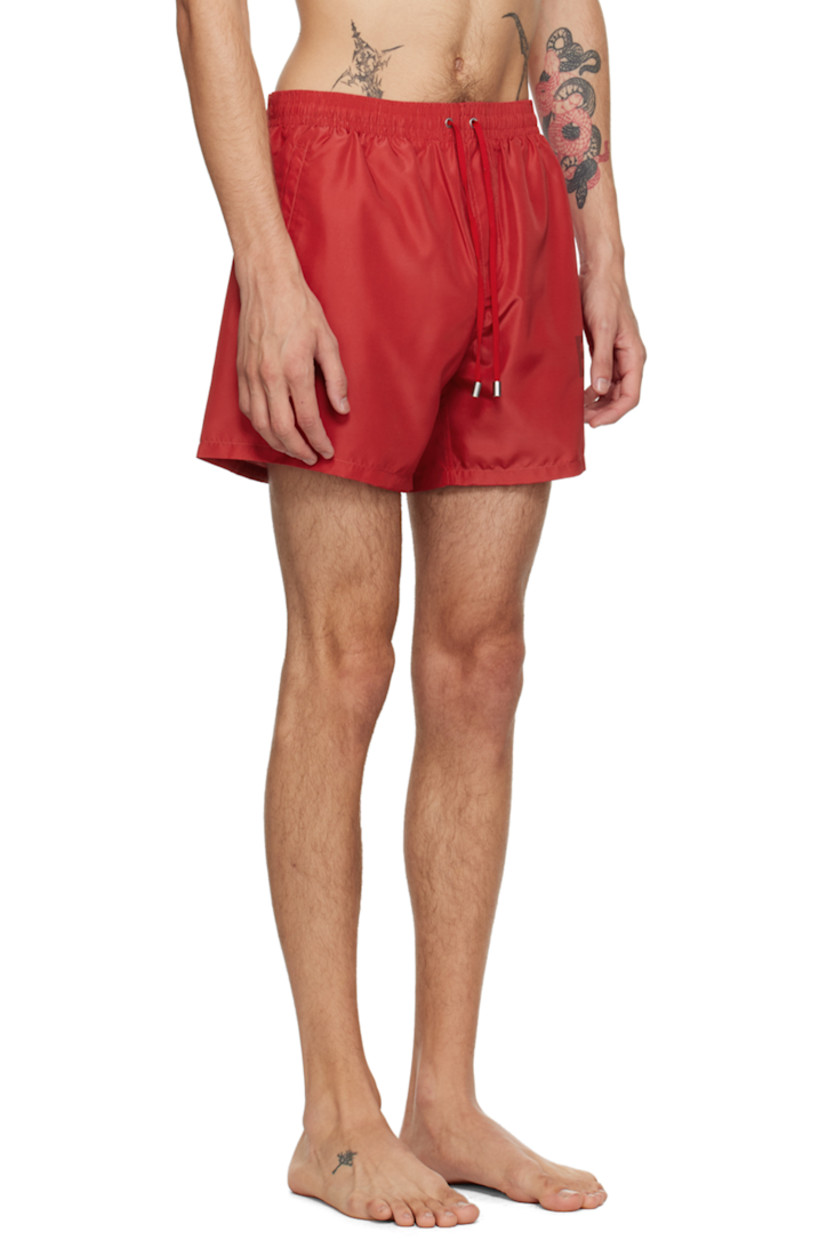 Polyester taffeta swim shorts.

· Drawstring at elasticized waistband
· Two-pocket styling
· Logo printed at outseam
· Partial mesh lining

Supplier color: Red