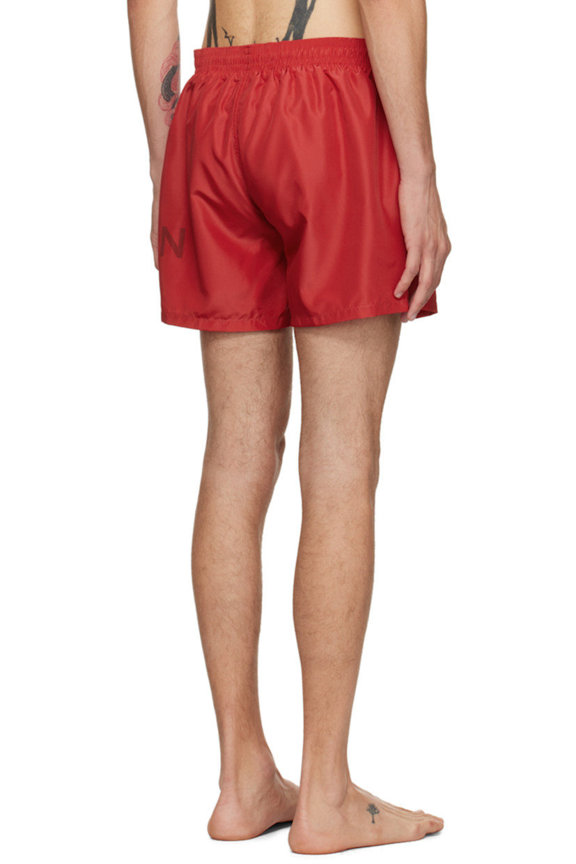 Polyester taffeta swim shorts.

· Drawstring at elasticized waistband
· Two-pocket styling
· Logo printed at outseam
· Partial mesh lining

Supplier color: Red