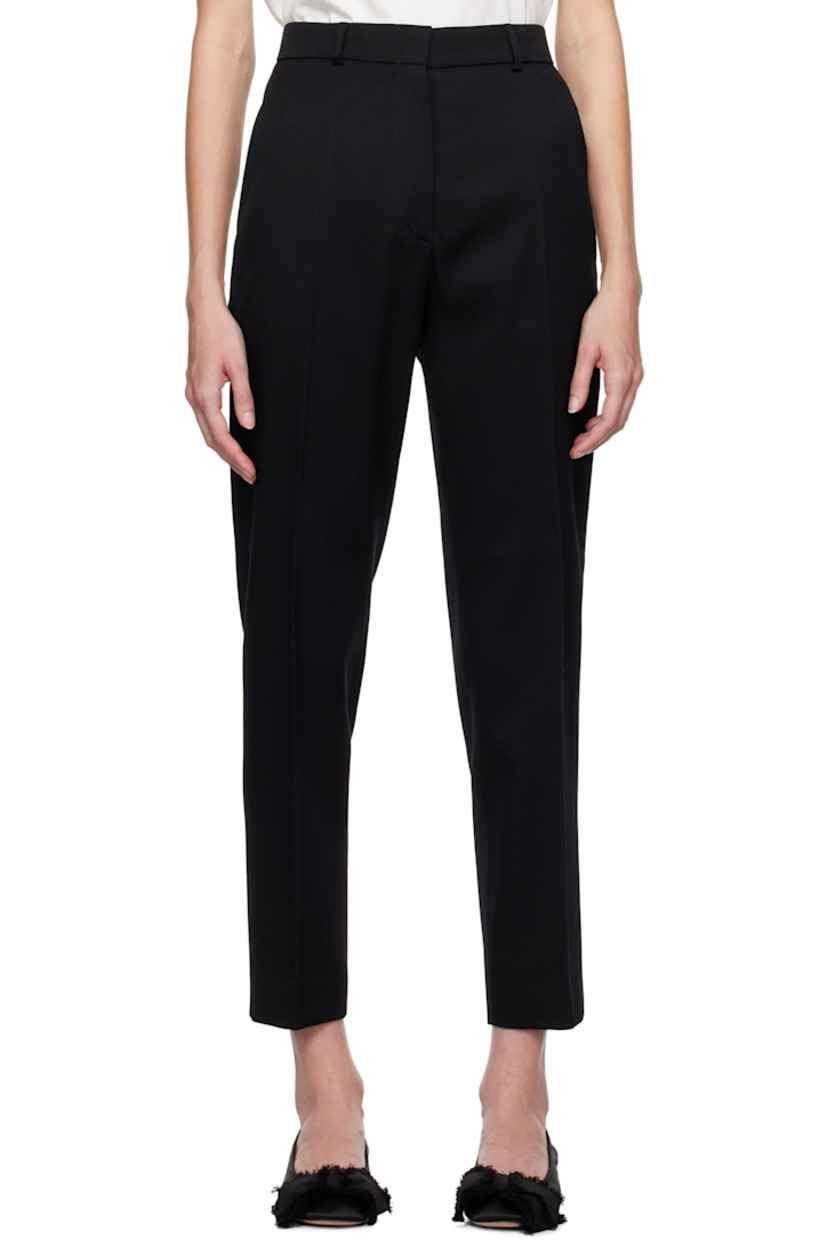Slim-fit and tapered virgin wool twill trousers.

· Mid-rise
· Belt loops
· Four-pocket styling
· Zip-fly
· Creased legs
· Unfinished hem
· Horn hardware

Supplier color: Black