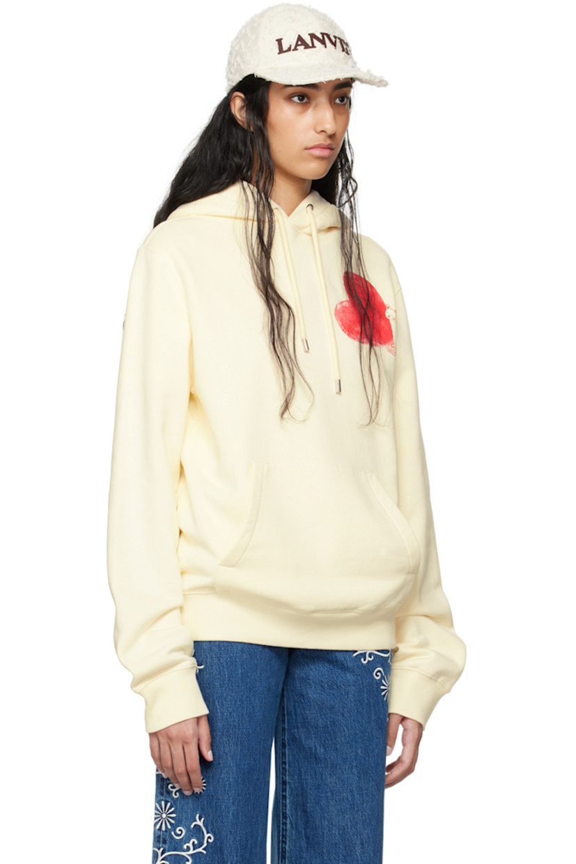 Cotton fleece hoodie. 

· Drawstring at hood
· Graphic printed at chest 
· Kangaroo pocket 
· Rib knit hem and cuffs 
· Logo-engraved silver-tone hardware 

Supplier color: Cream