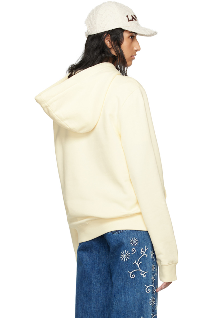 Cotton fleece hoodie. 

· Drawstring at hood
· Graphic printed at chest 
· Kangaroo pocket 
· Rib knit hem and cuffs 
· Logo-engraved silver-tone hardware 

Supplier color: Cream