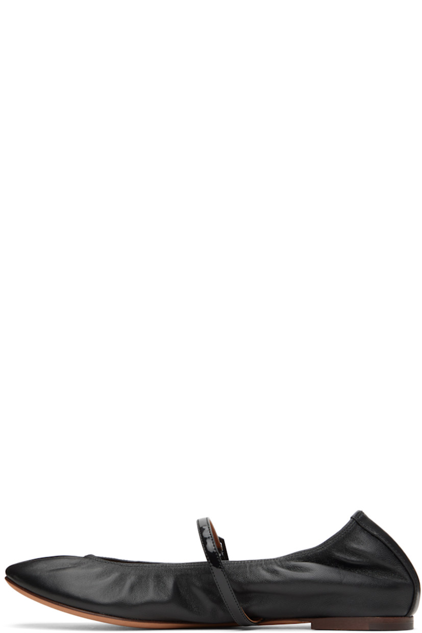Buffed calfskin Mary Jane-style ballerina flats in black.

· Pin-buckle strap at vamp
· Logo stamp at heel
· Buffed goatskin lining
· Leather sole with rubber injection

Supplier color: Black