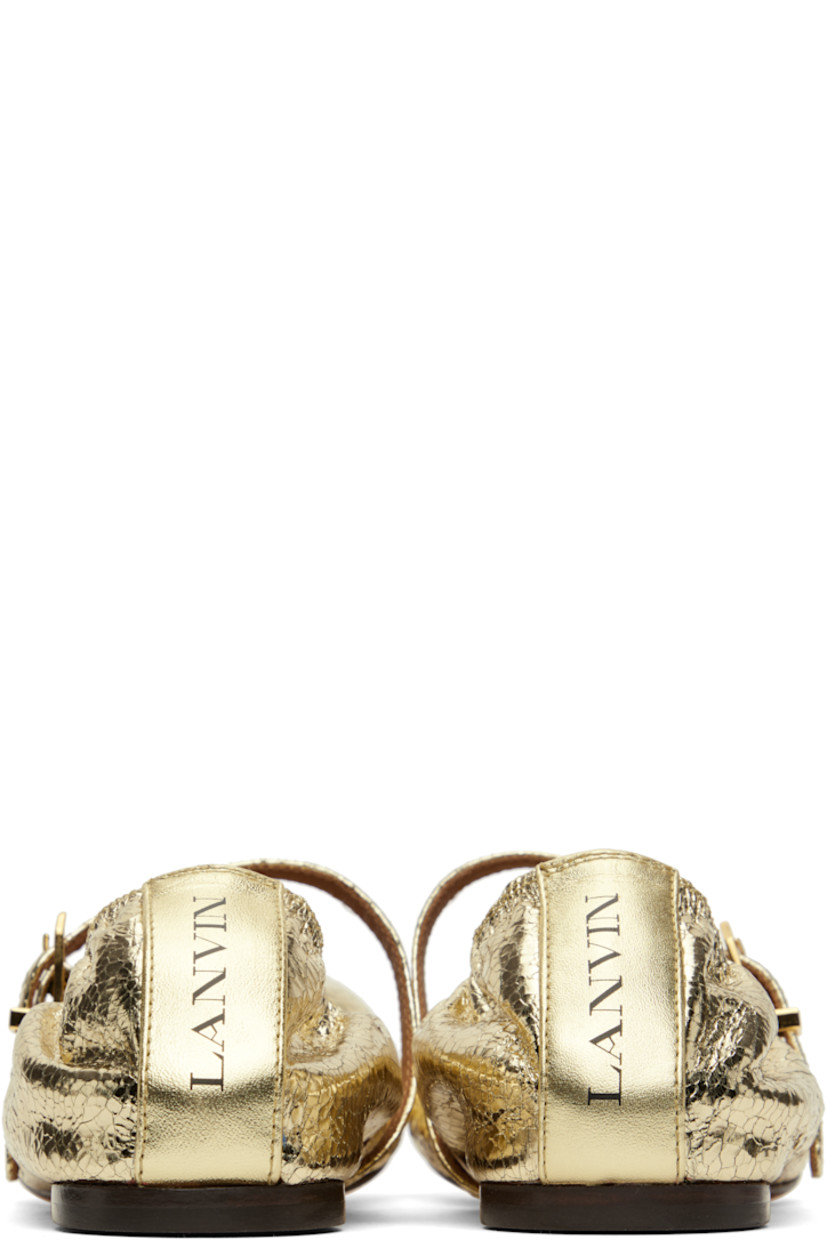 Cracked calfskin Mary Jane-style ballerina flats in gold tone.

· Pin-buckle strap at vamp
· Logo printed at heel
· Buffed goatskin lining
· Leather sole with rubber injection

Supplier color: Gold