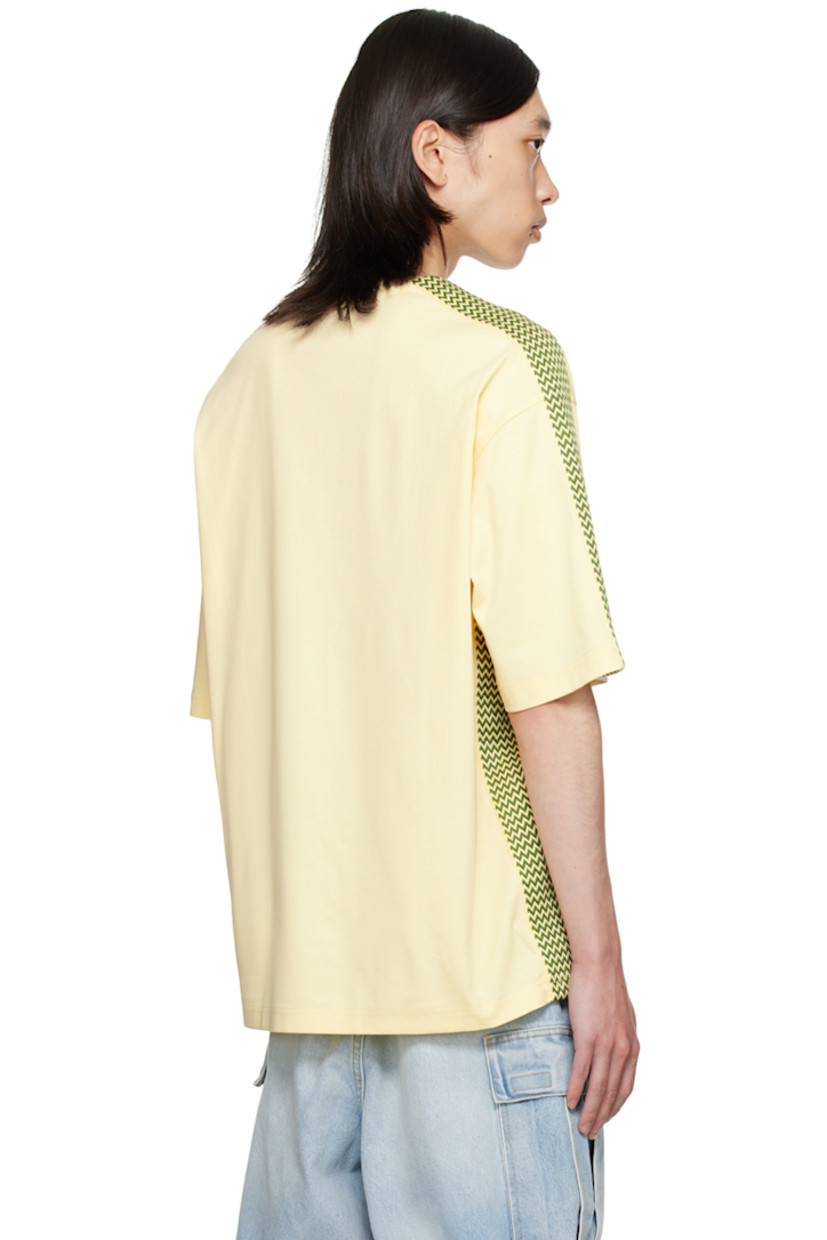 Loose-fit cotton jersey T-shirt. Woven chevron trim at side seams, shoulders, and sleeves.

· Rib knit crewneck
· Logo embroidered at chest
· Dropped shoulders

Supplier color: Quartz