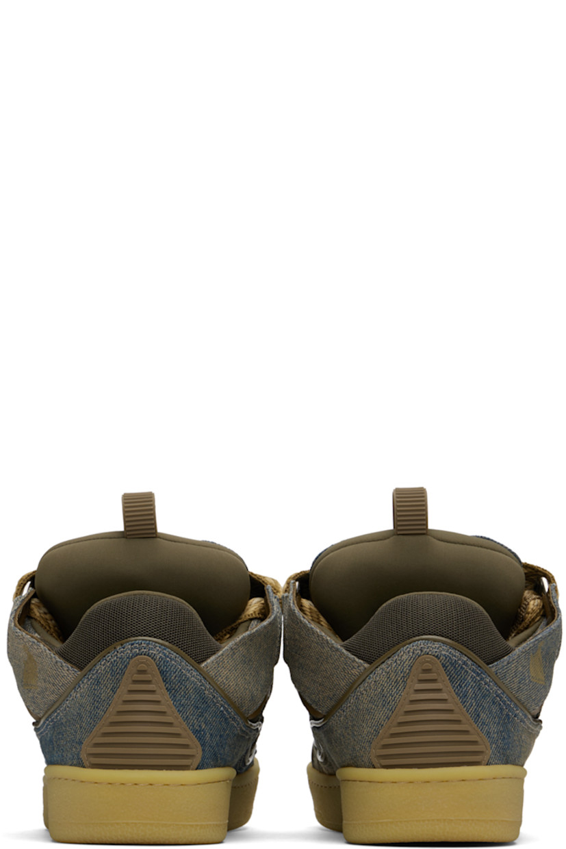 Low-top denim and buffed leather sneakers in blue and brown.

· Fading and piping throughout
· Logo embossed at toe
· Rubberized trim at toe and heel counter
· Lace-up closure
· Padded tongue and collar
· Pull-loop and logo plaque at tongue
· Logo stamp at outer side
· Cutouts at sides
· Jersey lining
· Treaded rubber sole

Available exclusively at SSENSE.

Supplier color: Brown/Khaki
