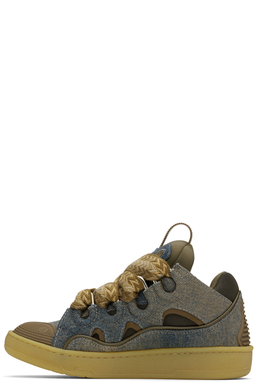 Low-top denim and buffed leather sneakers in blue and brown.

· Fading and piping throughout
· Logo embossed at toe
· Rubberized trim at toe and heel counter
· Lace-up closure
· Padded tongue and collar
· Pull-loop and logo plaque at tongue
· Logo stamp at outer side
· Cutouts at sides
· Jersey lining
· Treaded rubber sole

Available exclusively at SSENSE.

Supplier color: Brown/Khaki