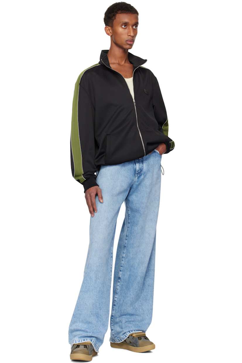 Low-top denim and buffed leather sneakers in blue and brown.

· Fading and piping throughout
· Logo embossed at toe
· Rubberized trim at toe and heel counter
· Lace-up closure
· Padded tongue and collar
· Pull-loop and logo plaque at tongue
· Logo stamp at outer side
· Cutouts at sides
· Jersey lining
· Treaded rubber sole

Available exclusively at SSENSE.

Supplier color: Brown/Khaki