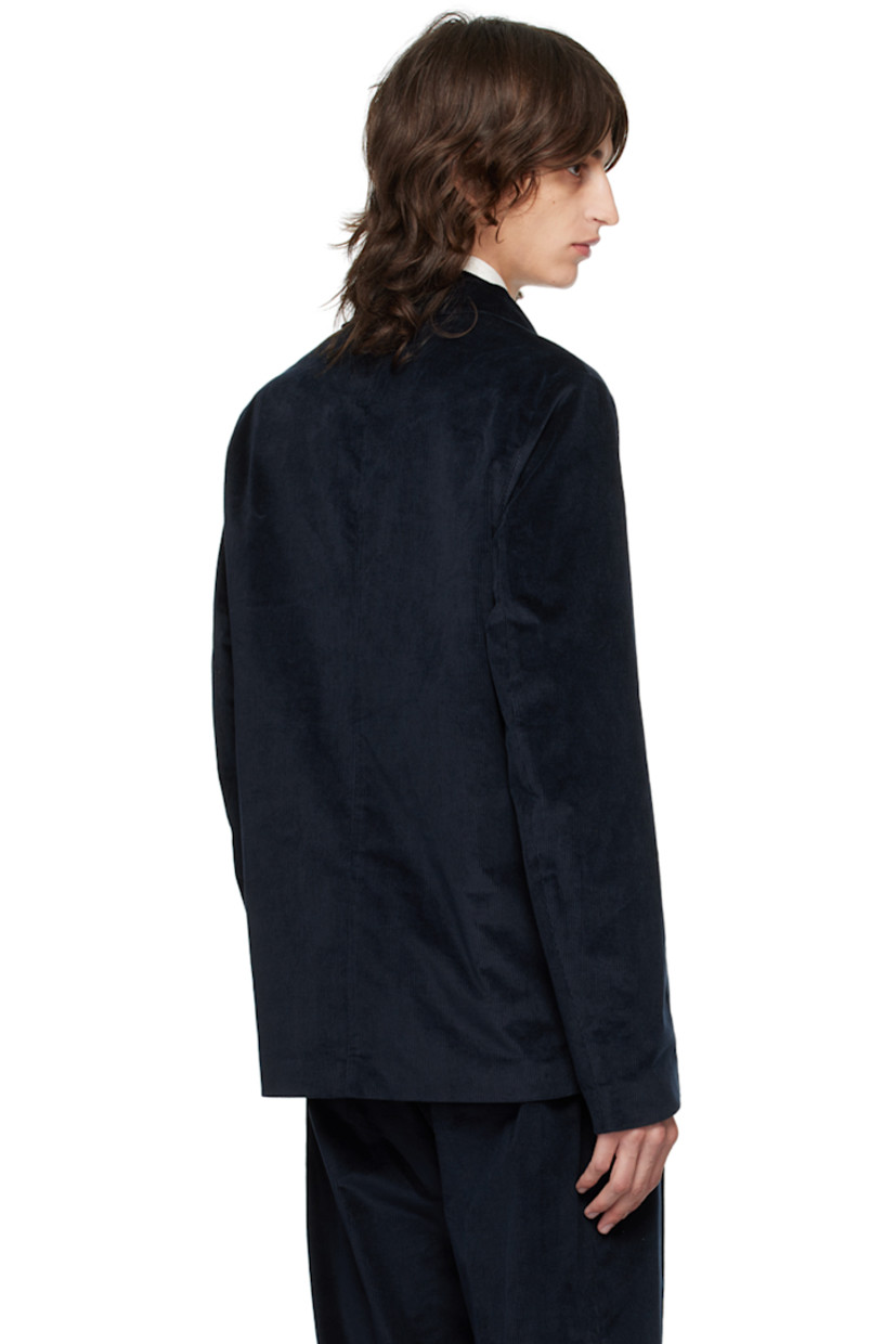 Stretch cotton- and wool-blend corduroy blazer. 

· Spread collar
· Button closure
· Patch pockets 
· Welt pockets at interior
· Full viscose satin lining

Supplier color: Blues