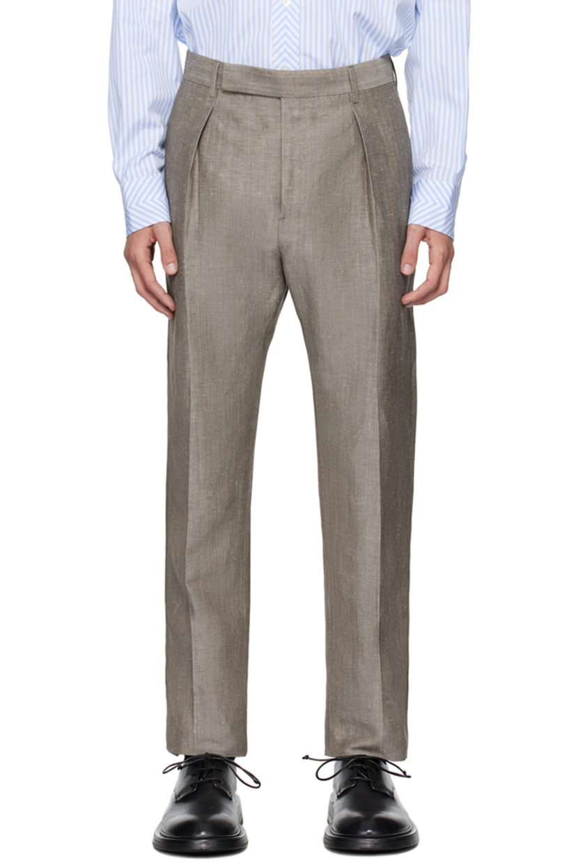 Linen- and wool-blend twill trousers. 

· Adjustable cinch tab at waistband
· Four-pocket styling 
· Zip-fly
· Central creases at front and back
· Partial viscose satin lining 

Supplier color: Browns
