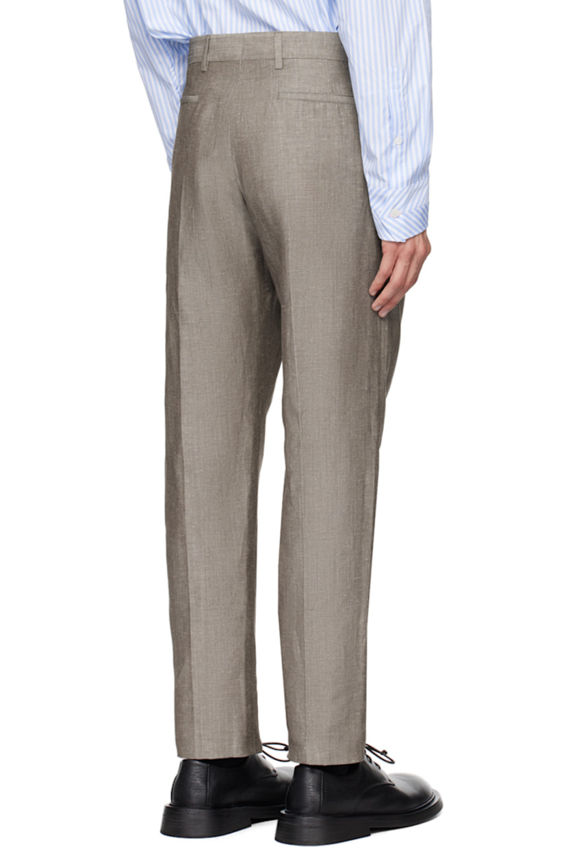 Linen- and wool-blend twill trousers. 

· Adjustable cinch tab at waistband
· Four-pocket styling 
· Zip-fly
· Central creases at front and back
· Partial viscose satin lining 

Supplier color: Browns