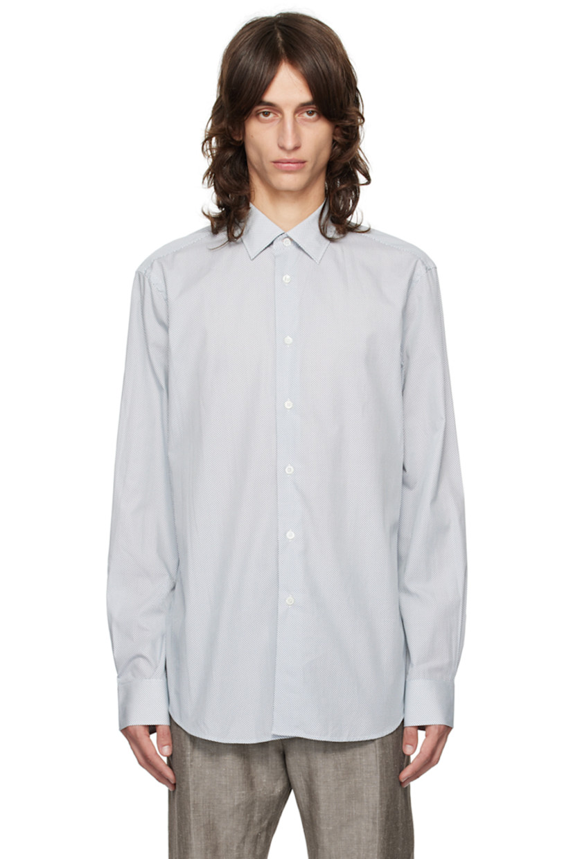 Cotton poplin shirt. Check pattern throughout.

· Spread collar 
· Button closure
· Shirttail hem
· Single-button barrel cuffs 

Supplier color: Blues