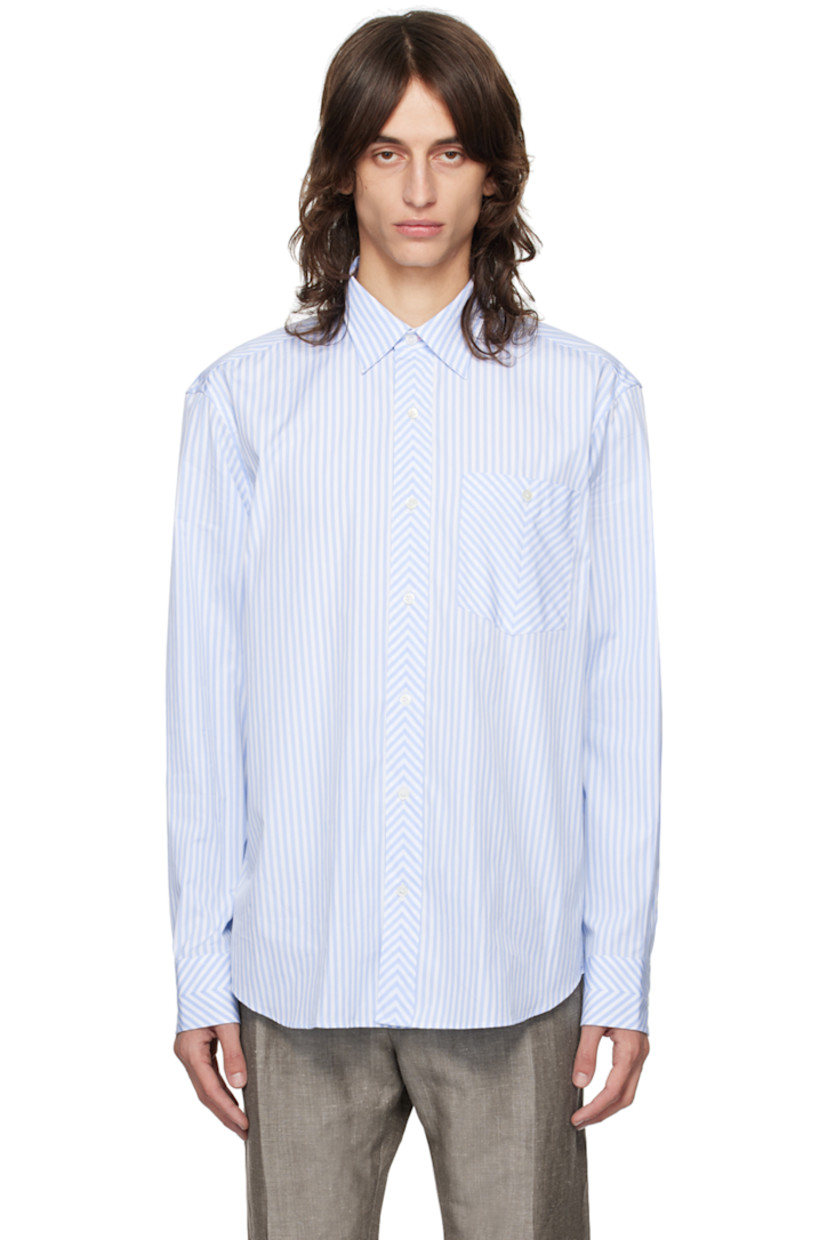 Oversized cotton poplin shirt. Stripes throughout.

· Spread collar
· Button closure 
· Patch pocket
· Shirttail hem
· Single-button barrel cuffs 

Supplier color: Blues
