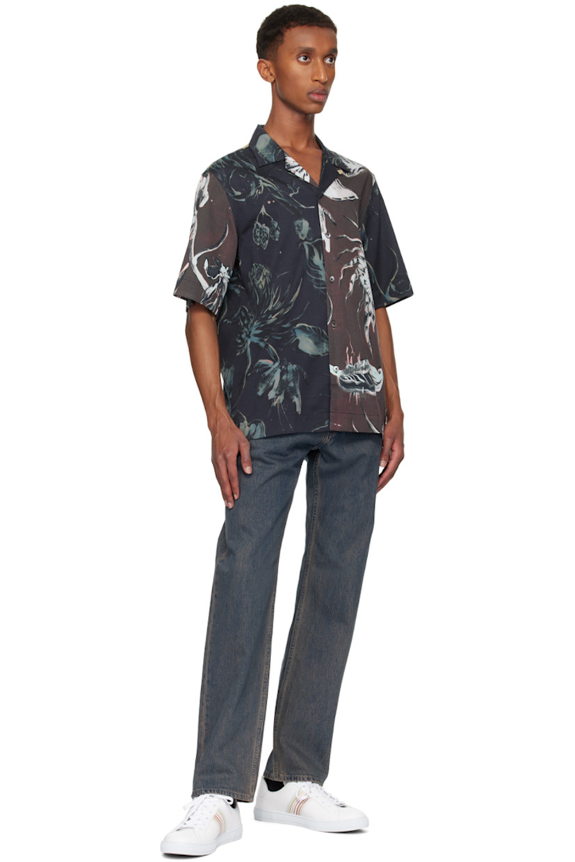 Lightweight lyocell- and cotton-blend twill shirt. Floral pattern throughout.

· Paneled construction
· Open spread collar
· Button closure
· Tennis-tail hem

Supplier color: Navy