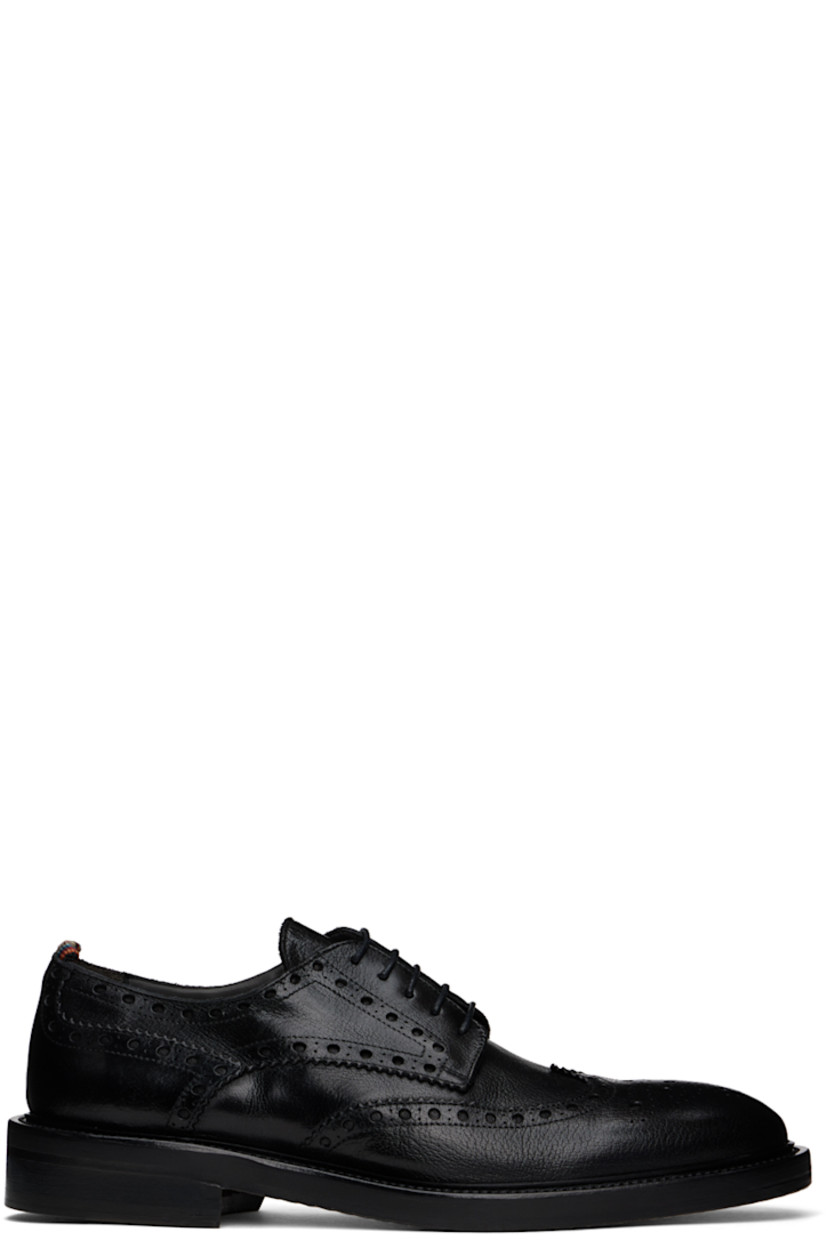 Polished grained buffalo leather derbys in black.

· Brogue and serrated detailing throughout
· Almond toe
· Lace-up closure
· Striped grosgrain trim at heel
· Buffed leather and suede lining
· Stacked leather heel with rubber injection
· Polished leather sole
· Heel: H1.5"

Supplier color: Black