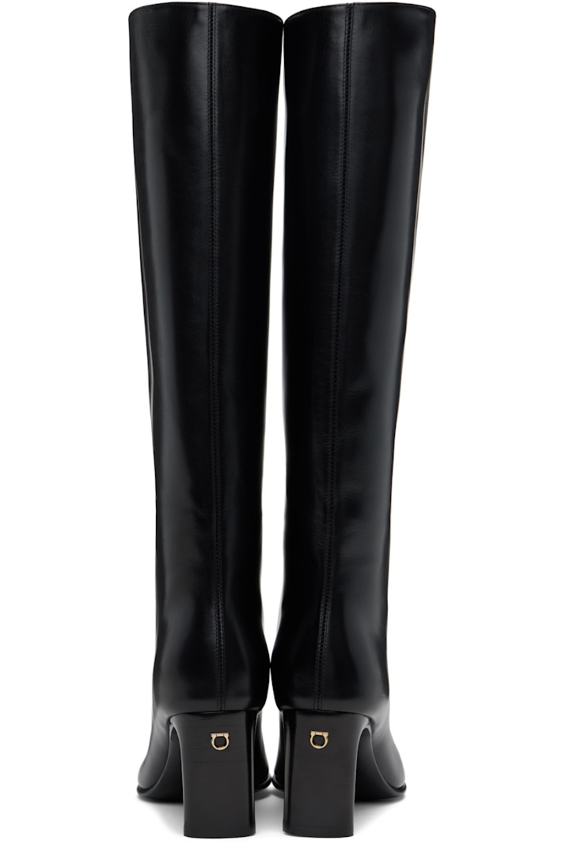 Knee-high buffed calfskin boots in black.

· Pointed square toe
· Grained calfskin lining
· Logo hardware at covered block heel
· Leather sole
· Heel: H2.75"

Supplier color: Nero
