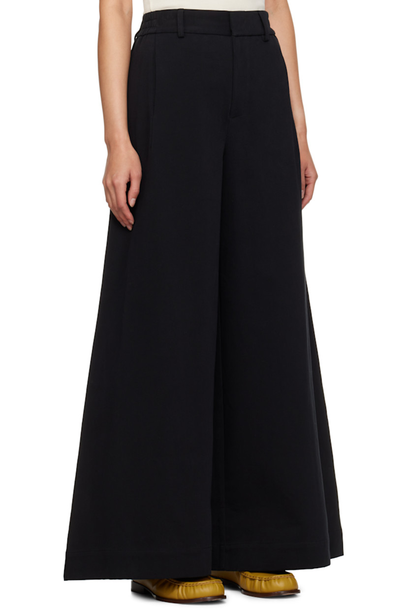 Wide-leg cotton twill trousers.

· Belt loops at partially elasticized waistband 
· Three-pocket styling 
· Zip-fly

Supplier color: Black