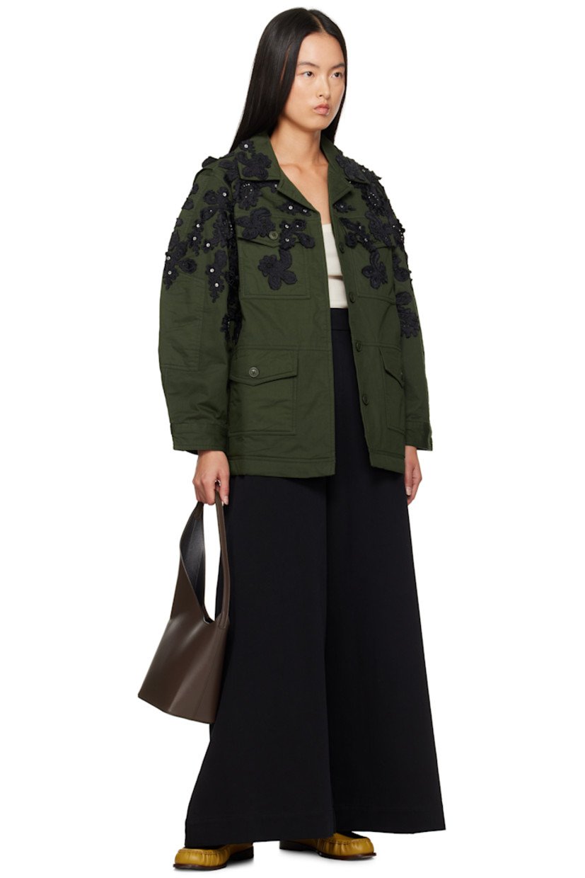 Wide-leg cotton twill trousers.

· Belt loops at partially elasticized waistband 
· Three-pocket styling 
· Zip-fly

Supplier color: Black
