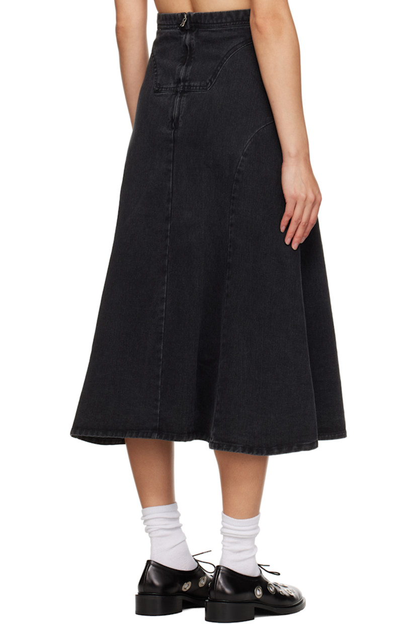 Non-stretch denim midi skirt. 

· Paneled construction
· Central vent at front hem 
· Zip closure at back waistband

Supplier color: Black