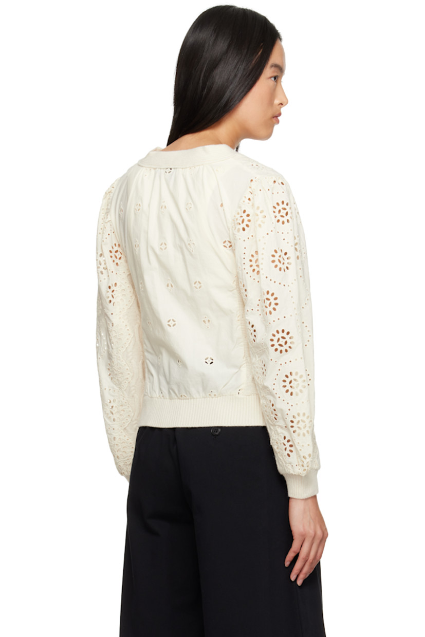 Relaxed-fit knit wool and cotton cardigan. Broderie anglaise detailing throughout.

· Rib-knit Y-neck, hem, and cuffs
· Button closure
· Balloon sleeves

Supplier color: Cream