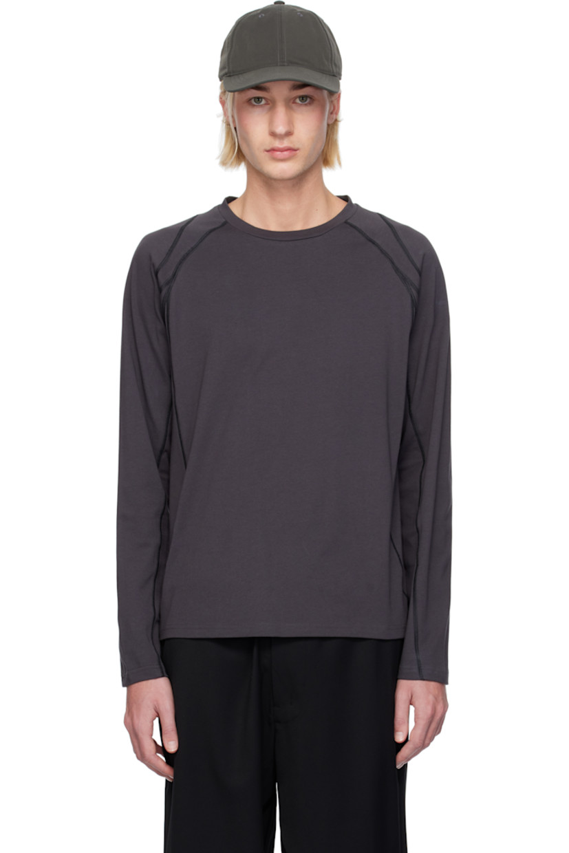 Cotton- and polyester-blend jersey T-shirt. Overlock stitching throughout.

· Rib-knit crewneck, hem, and cuffs
· Raglan sleeves

Available exclusively at SSENSE.

Supplier color: Grey