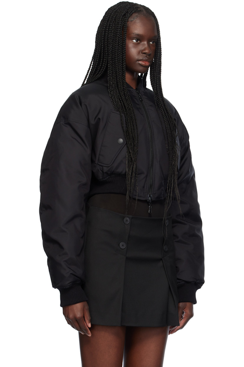 Reversible down-filled nylon canvas bomber jacket.

Reverse in black quilted nylon taffeta. 

· Rib knit stand collar, hem, and cuffs
· Two-way zip closure
· Flap pockets
· Cropped hem
· Dropped shoulders
· Zip pockets at interior

Supplier color: Black

Fill: 90% duck down, 10% feathers.
