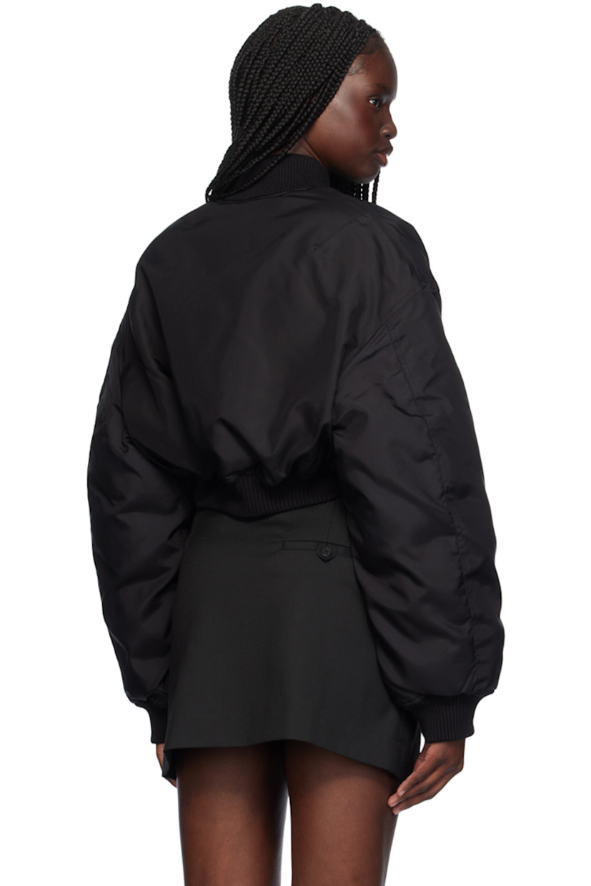 Reversible down-filled nylon canvas bomber jacket.

Reverse in black quilted nylon taffeta. 

· Rib knit stand collar, hem, and cuffs
· Two-way zip closure
· Flap pockets
· Cropped hem
· Dropped shoulders
· Zip pockets at interior

Supplier color: Black

Fill: 90% duck down, 10% feathers.