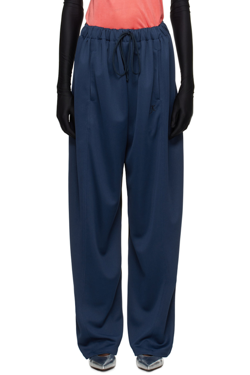 Wool- and polyester-blend mesh and twill lounge pants. 

· Paneled construction
· Drawstring at partially elasticized waistband 
· Three-pocket styling 
· Logo embroidered at front 

Available exclusively at SSENSE.

Supplier color: Black/D.Navy