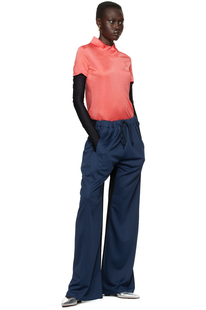 Wool- and polyester-blend mesh and twill lounge pants. 

· Paneled construction
· Drawstring at partially elasticized waistband 
· Three-pocket styling 
· Logo embroidered at front 

Available exclusively at SSENSE.

Supplier color: Black/D.Navy
