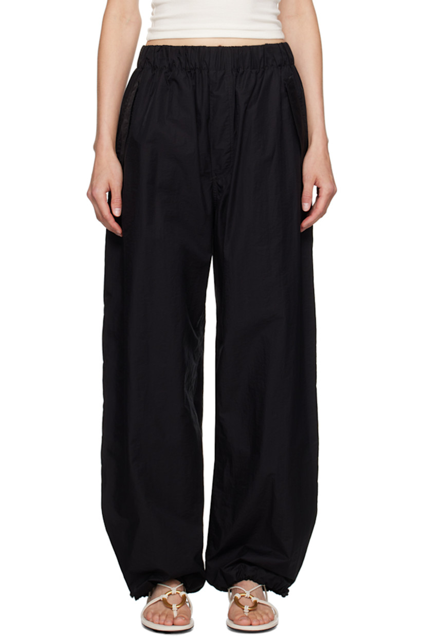 Cotton- and nylon-blend micro ripstop trousers.

· Concealed drawstring at elasticized waistband
· Three-pocket styling
· Mock-fly 
· Bungee-style drawstring at cuffs

Supplier color: Black