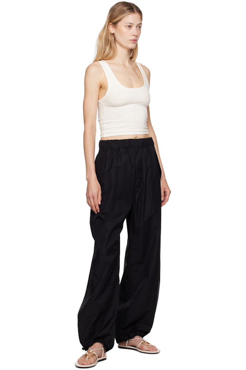 Cotton- and nylon-blend micro ripstop trousers.

· Concealed drawstring at elasticized waistband
· Three-pocket styling
· Mock-fly 
· Bungee-style drawstring at cuffs

Supplier color: Black