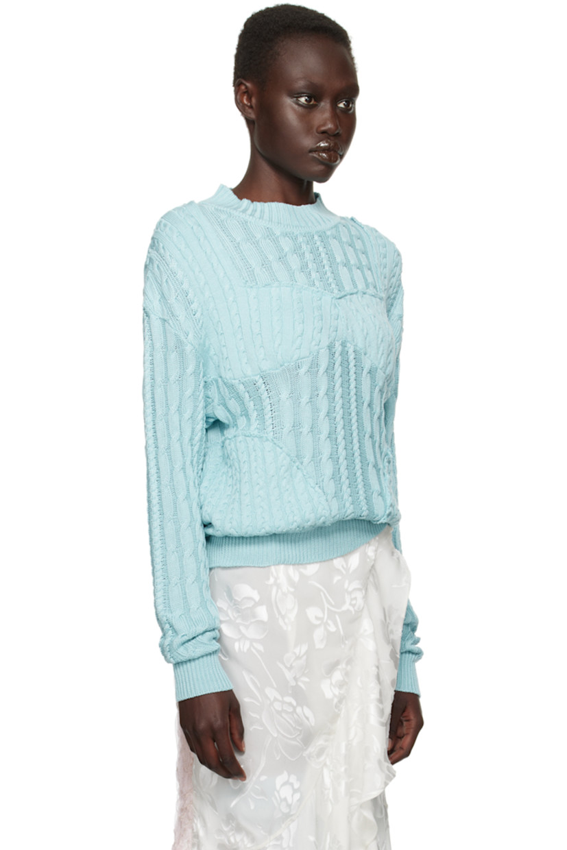 Cable-knit mulberry silk-blend sweater. Raw edges throughout.

· Paneled construction
· Rib-knit crewneck, hem, and cuffs
· Dropped shoulders
· Cutout at sleeve

Available exclusively at SSENSE.

Supplier color: Aqua