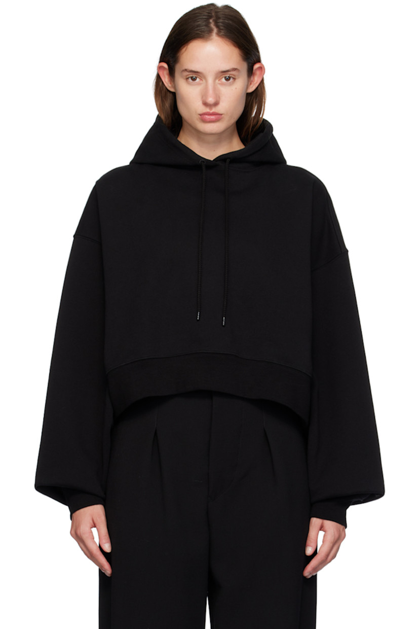 French terry hoodie.

· Drawstring at hood
· Rib knit hem and cuffs
· Dropped shoulders
· Extended sleeves

Supplier color: Black