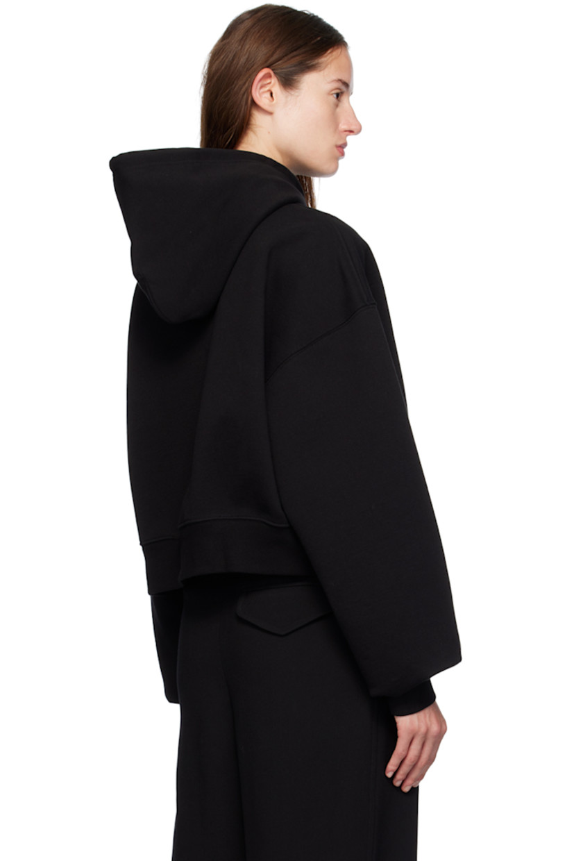 French terry hoodie.

· Drawstring at hood
· Rib knit hem and cuffs
· Dropped shoulders
· Extended sleeves

Supplier color: Black