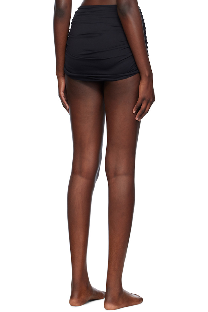 Stretch nylon jersey bikini bottoms.

· Ruching at skirt-style overlay
· Elasticized waistband

Supplier color: Black
