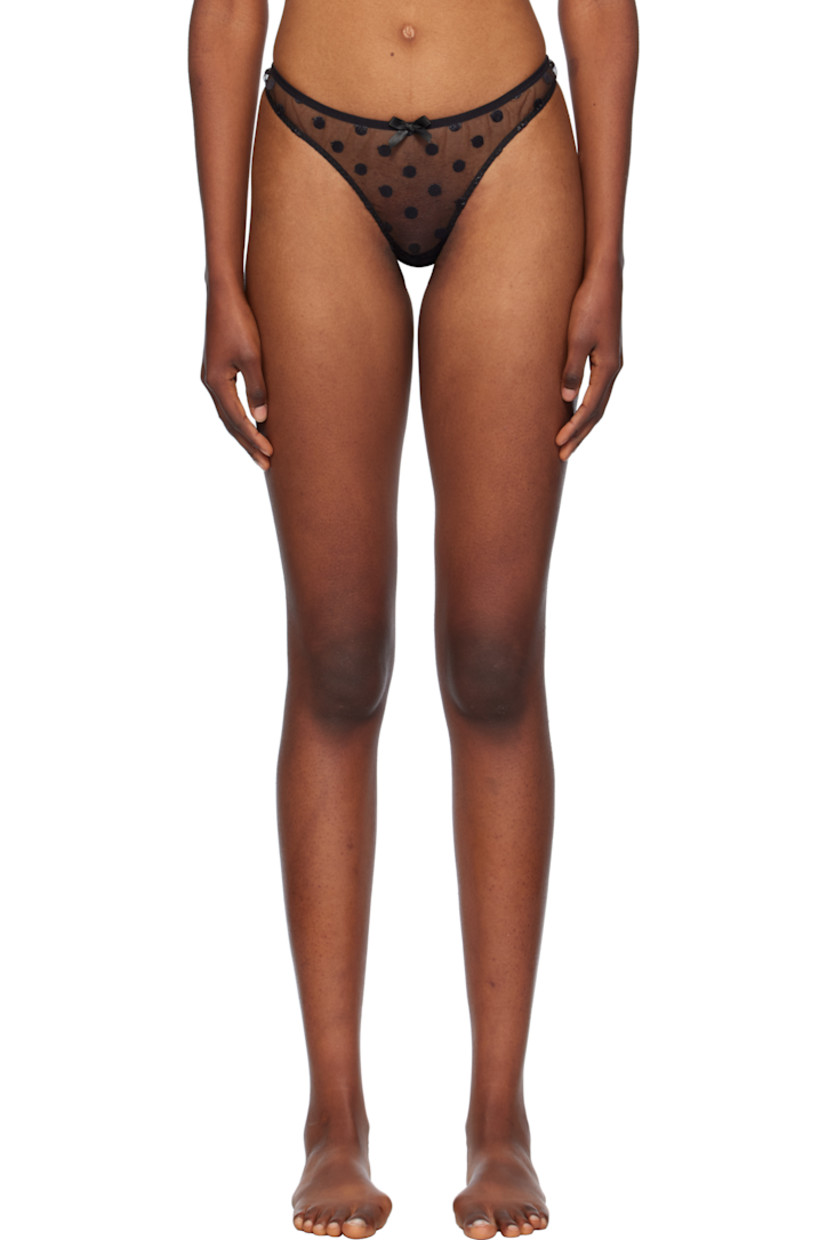 Sheer polyester tulle thong. Polka dot pattern embroidered throughout.

· Bow appliqué at elasticized waistband
· Partial cotton jersey lining

Supplier color: Black
