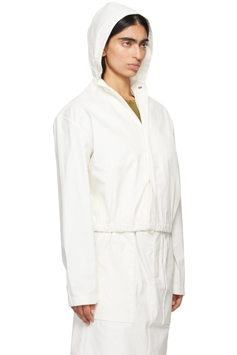 Handcrafted polyurethane-coated cotton twill jacket.

· Elasticized trim at hood 
· Two-way zip closure with press-stud fastening 
· Elasticized hem 
· Seam pockets
· Press-stud fastening at elasticized cuffs 
· Patch pockets at interior
· Unlined

Part of the Serie No.15 collection.

Supplier color: White