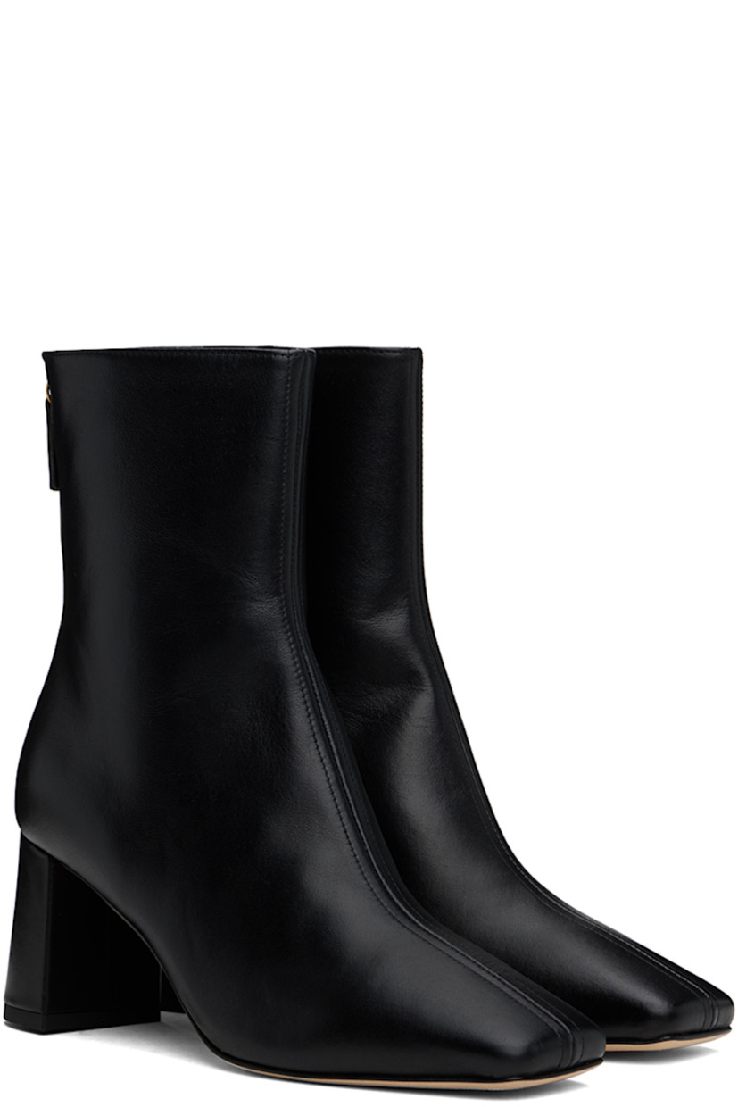 Handcrafted ankle-high polished leather boots in black.

· Pointed square toe
· Zip closure at back
· Logo embossed at padded leather insole
· Buffed leather lining
· Covered block heel with rubber injection
· Suede sole
· Heel: H2.75"

Supplier color: Black